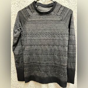 Lululemon Rest Less Pullover in a heathered black/gray pattern